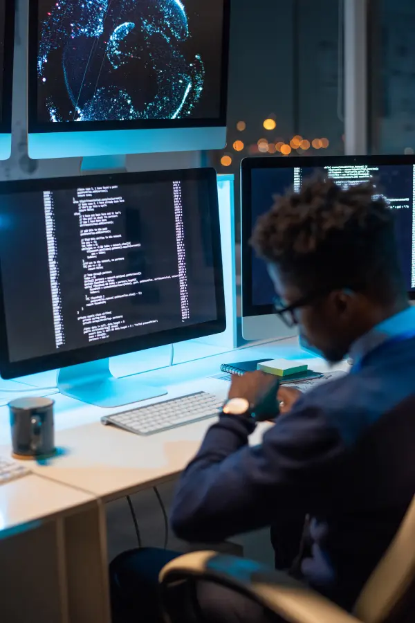 busy-young-programmer-looking-at-wristwatch-while-2025-03-13-23-53-00-utc-1